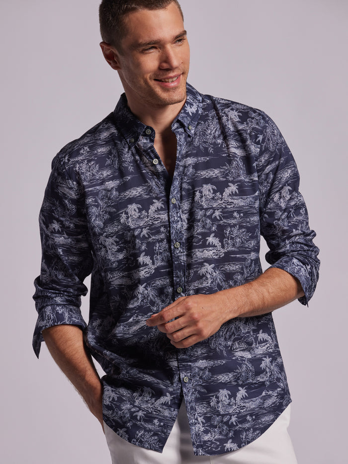 Light tropical-print long-sleeve shirt, man poses front view with one hand in pocket (Images 1 & 2).