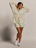 Cream with green floral print, cotton-rayon gauze boyfriend-fit blouse, relaxed fit, front view.
