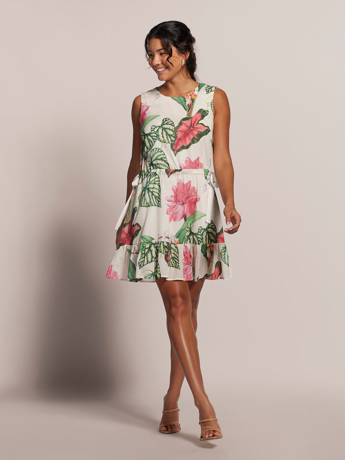 Pink and white mini floral sleeveless voile dress with adjustable waist, full front view (Images 1 & 2).