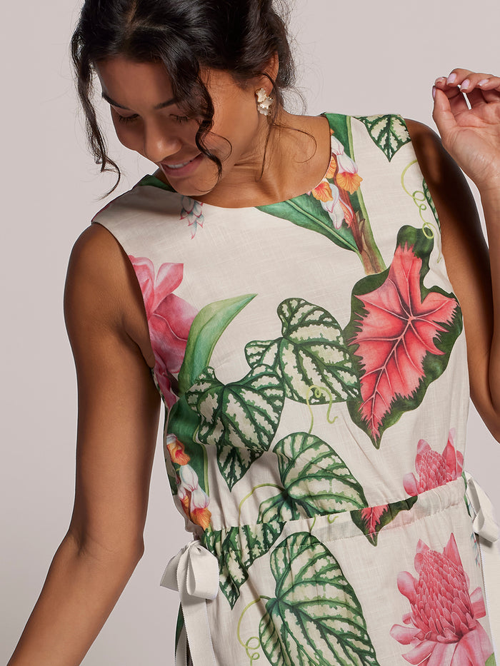 Multicolor tropical-print cotton voile dress with adjustable waist, front and side views.