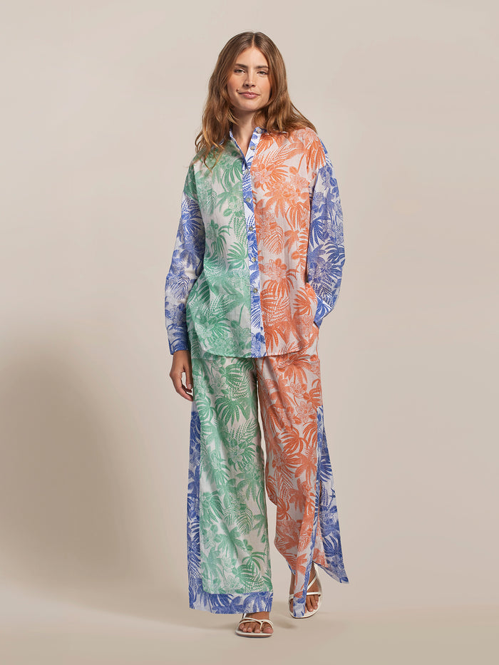 Multicolored leaf-print cotton voile oversized long-sleeve shirt, front view, worn by woman.