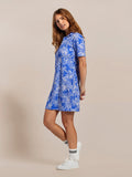 Light Blue Liandra dress with short sleeves, mid-length, and white sneakers, front view.