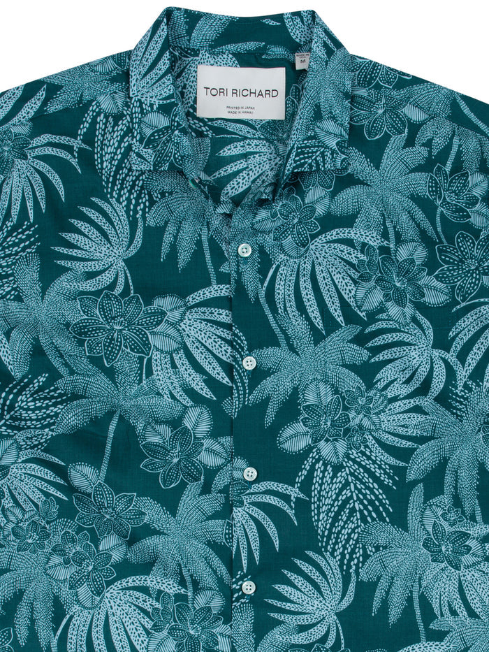 Teal with white tropical-print tall cotton shirt, front and angled side views.