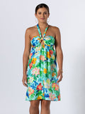 Magenta tropical-print sleeveless dress with hoop earrings and bracelet, front view.
