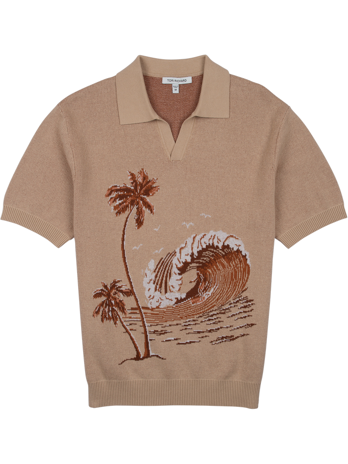 Tan short-sleeve sweater polo with palm tree and ocean wave front graphic, front view.