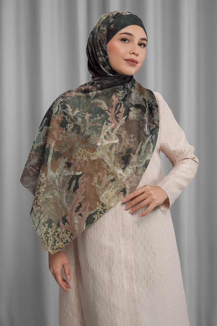 under the sea tie back shawl in orca by buttonscarves