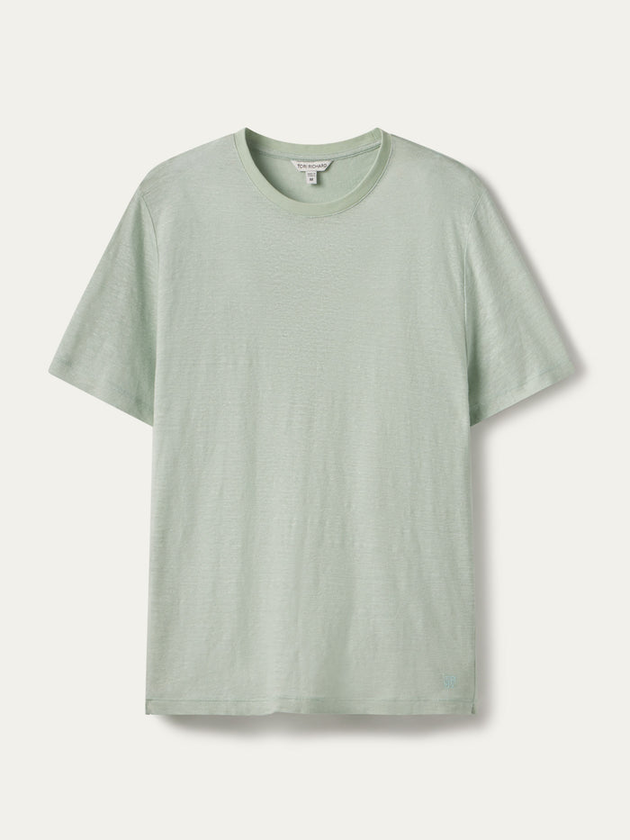 Light green linen short-sleeve crewneck t-shirt, front view on off-white background
