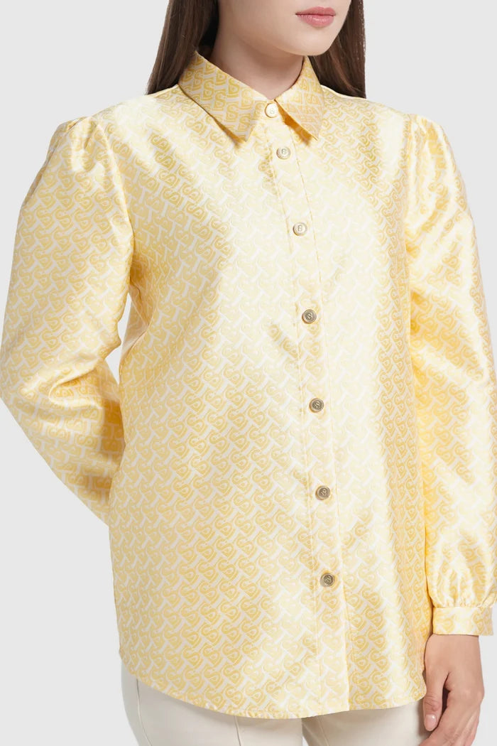verena puff shirt in butter yellow by buttonscarves signature b monogram pattern detail