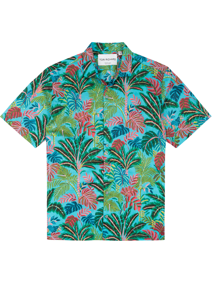 Light blue short-sleeve shirt with green Traveler’s Palm print, front view.