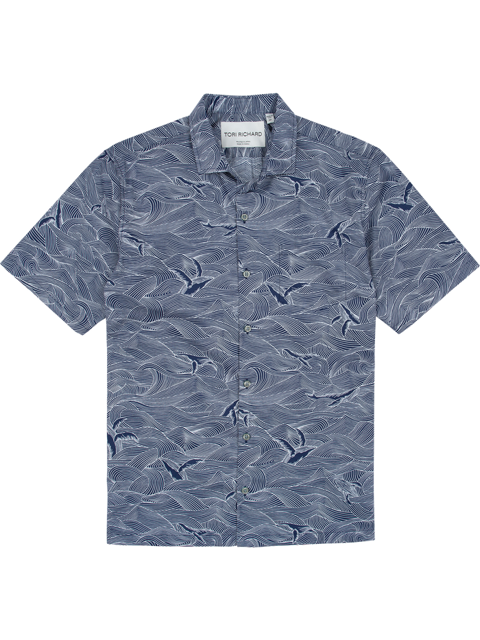 Navy and white wave and bird-print short-sleeve cotton shirt, flat lay view.