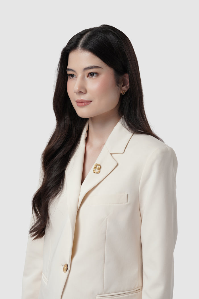 wicker petite brooch in gilding gold by buttonscarves on blazer