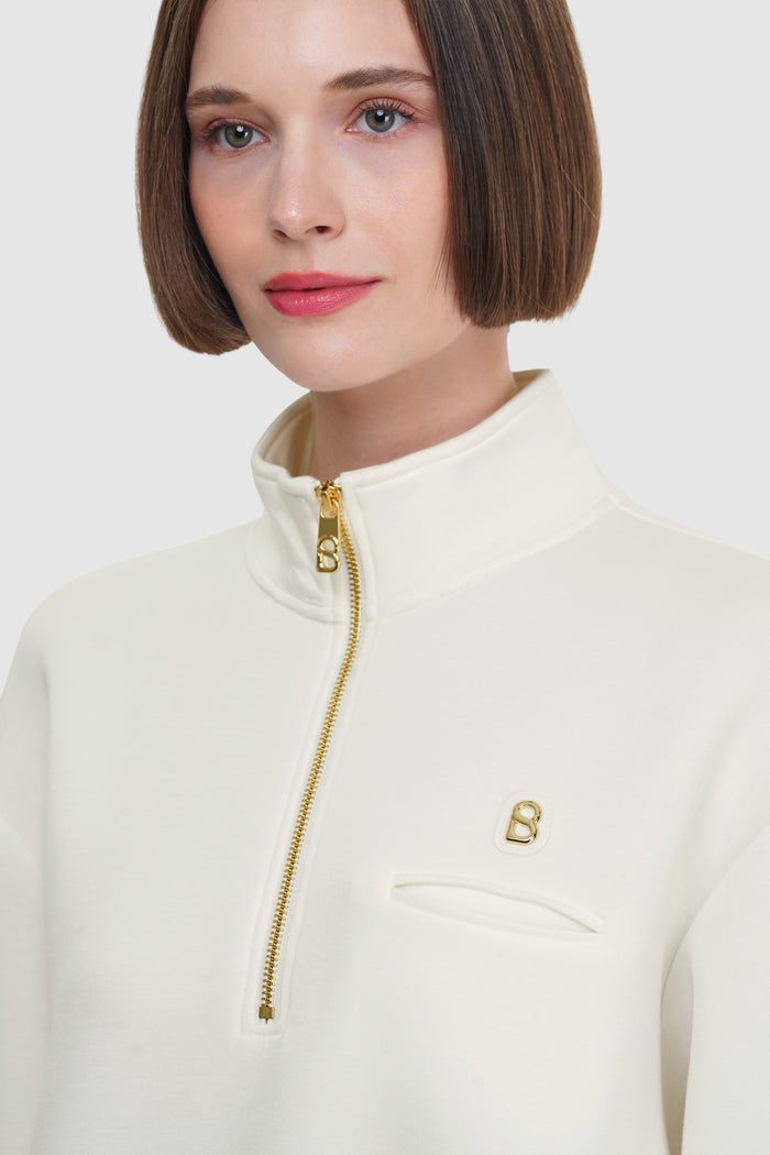 zoey sweatshirt in white by buttonscarves half zip detail